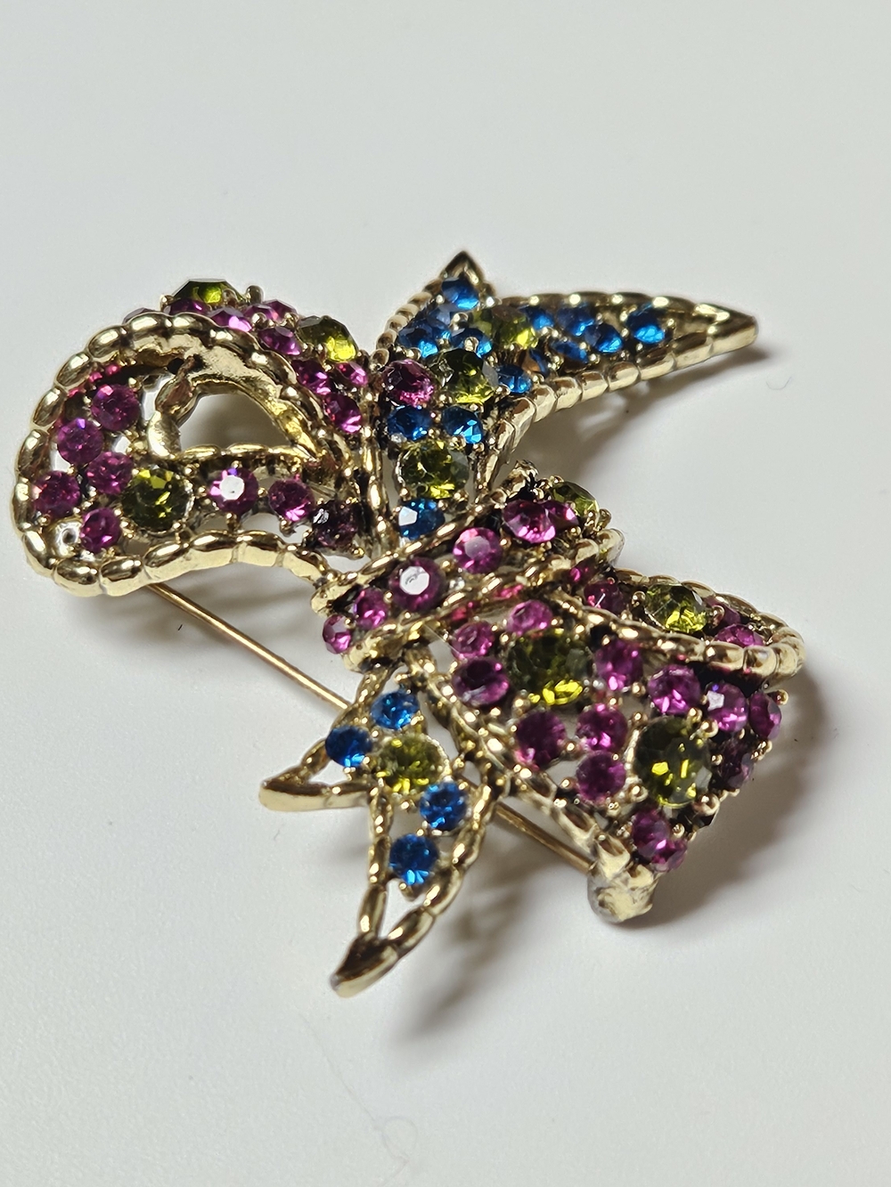 Gold Tone Multicolor Crystal Bow Brooch - Pink, Blue & Green Stones
